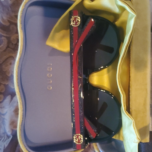 Gucci sunglasses  Hp new bagged tagged warranty includes all case gorgeous suede